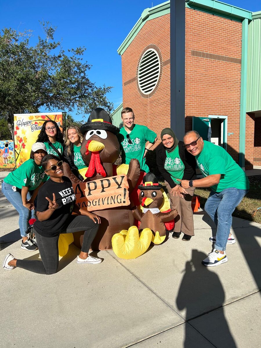 A community partner volunteering at an event