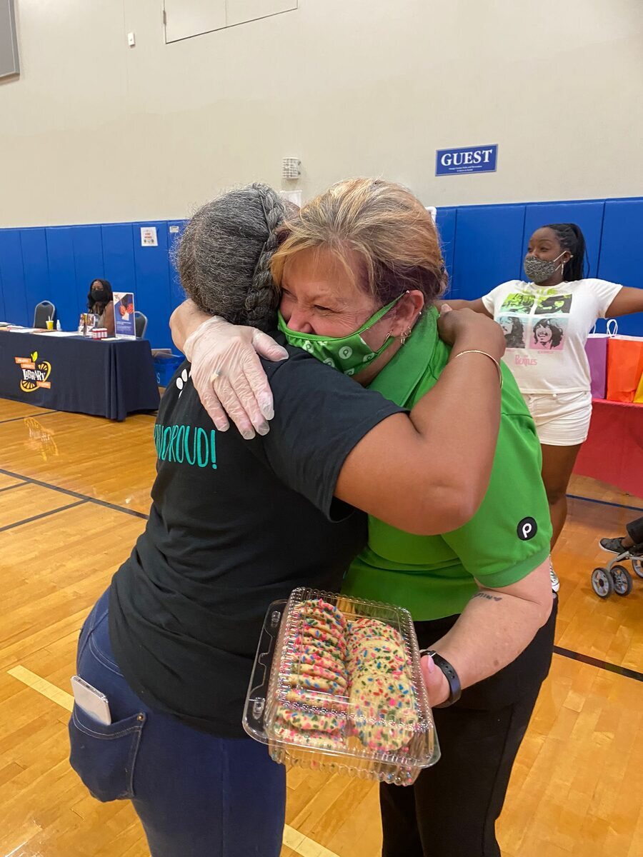 Volunteers packing groceries for families