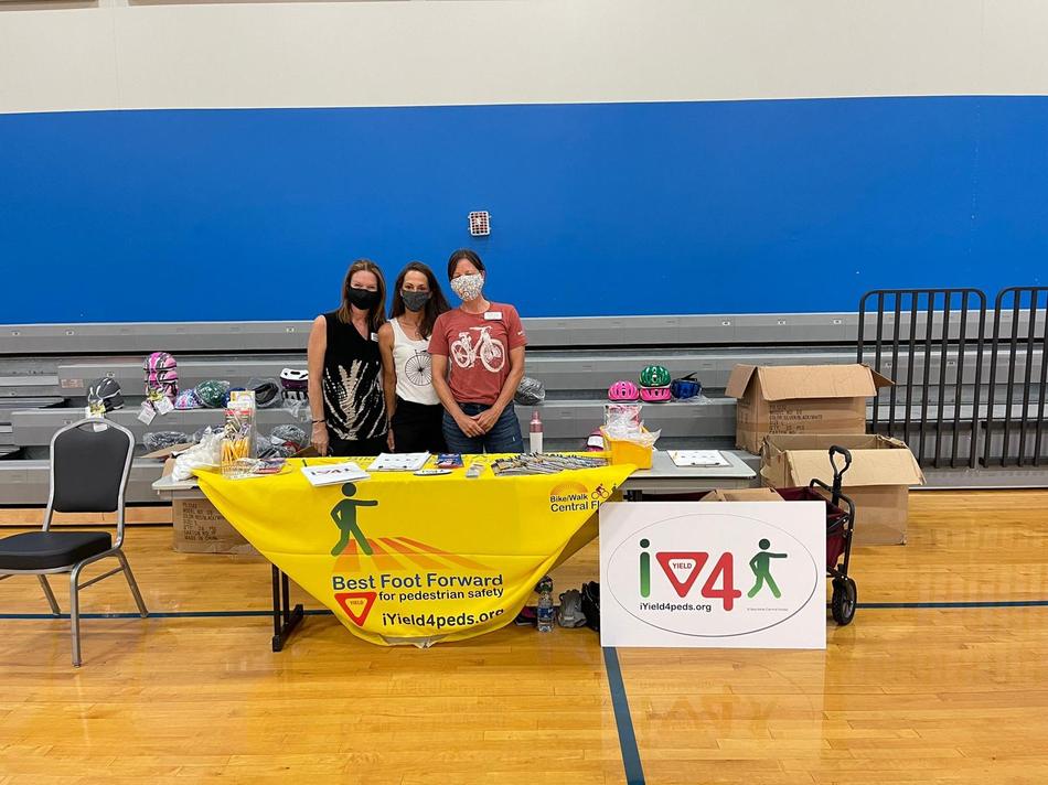 Mentors and volunteers with students